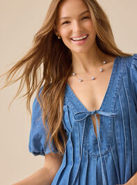 Evie Puff Sleeve Denim Romper Detail 3 - TULLABEE
