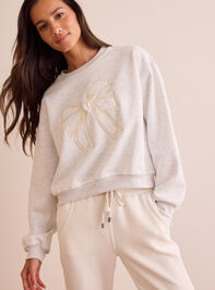 In Bow Motion Embroidered Cropped Pullover - TULLABEE