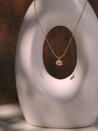 Infinite Twist Charm Necklace - TULLABEE