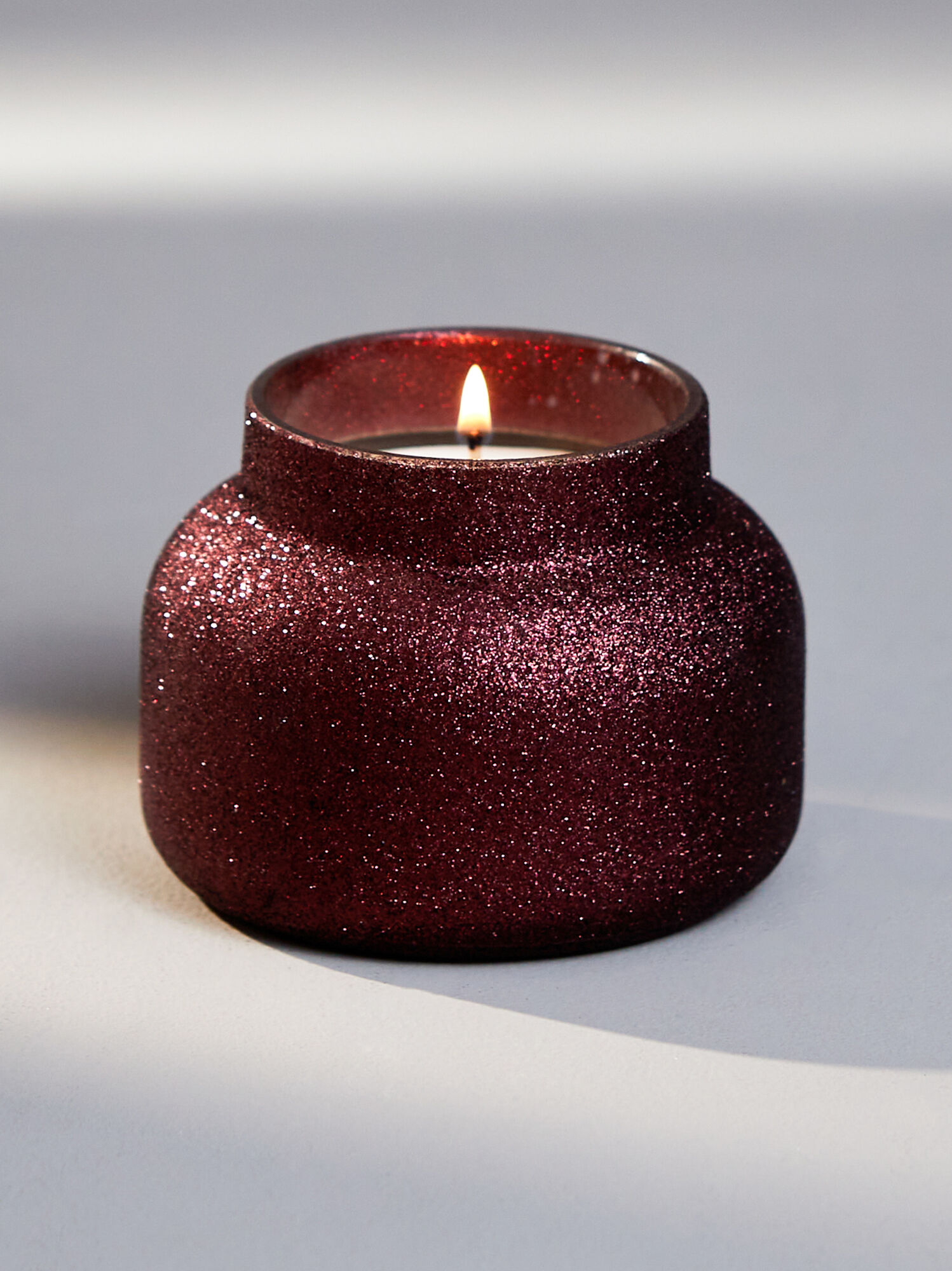 Capri Blue Tinsel & Spice Glitter Candle in Burgundy Altar'd State