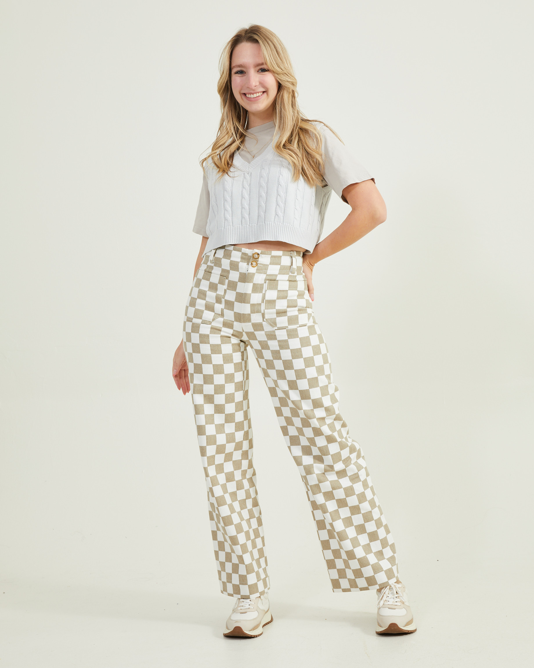 woman wearing checkered cargo pants